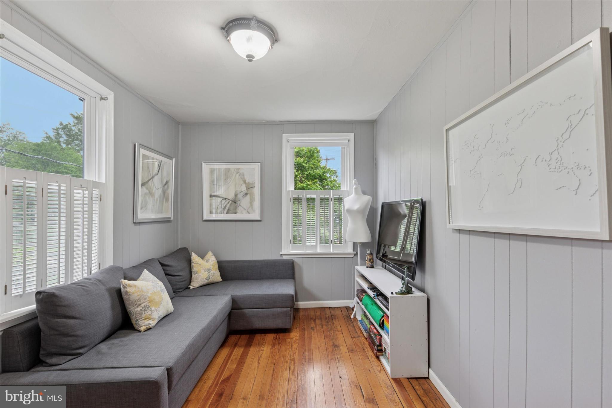 802 Upper Gulph Road Wayne, PA 19087 - Photo 27 of 45 a living room with furniture and a flat screen tv