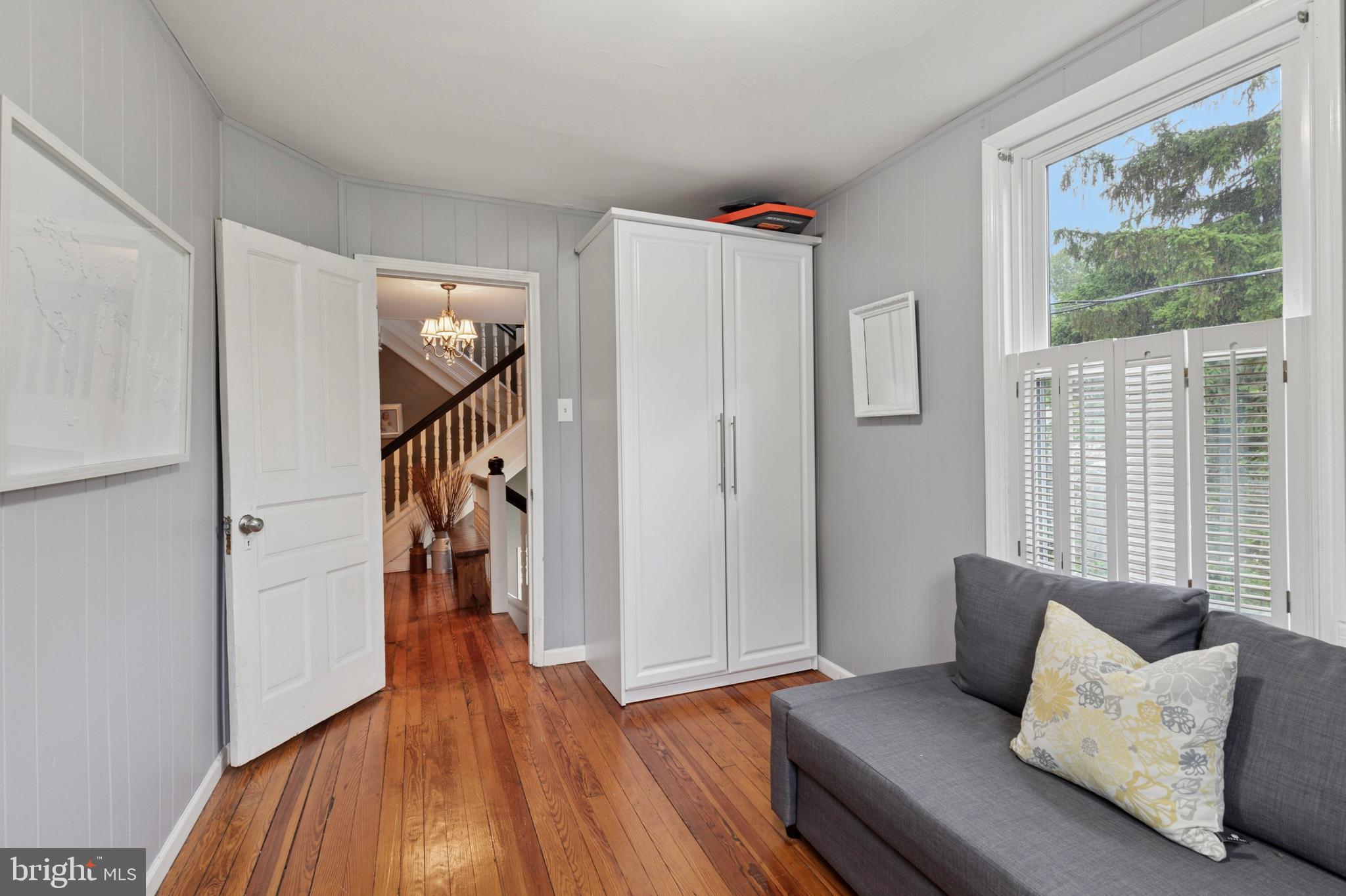 802 Upper Gulph Road Wayne, PA 19087 - Photo 28 of 45 a living room with furniture and a wooden floor