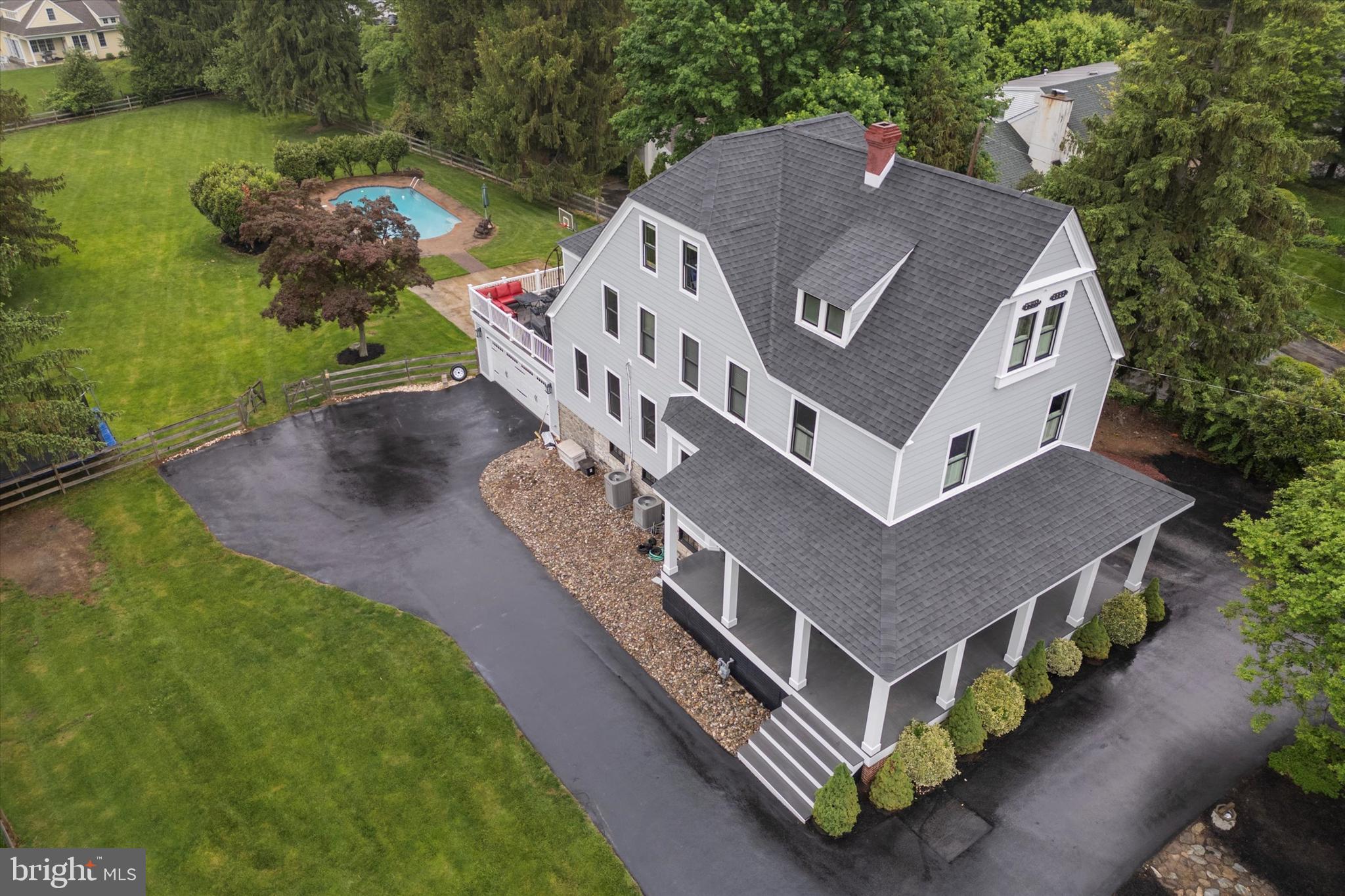 802 Upper Gulph Road Wayne, PA 19087 - Photo 38 of 45 a aerial view of a house with pool and a yard