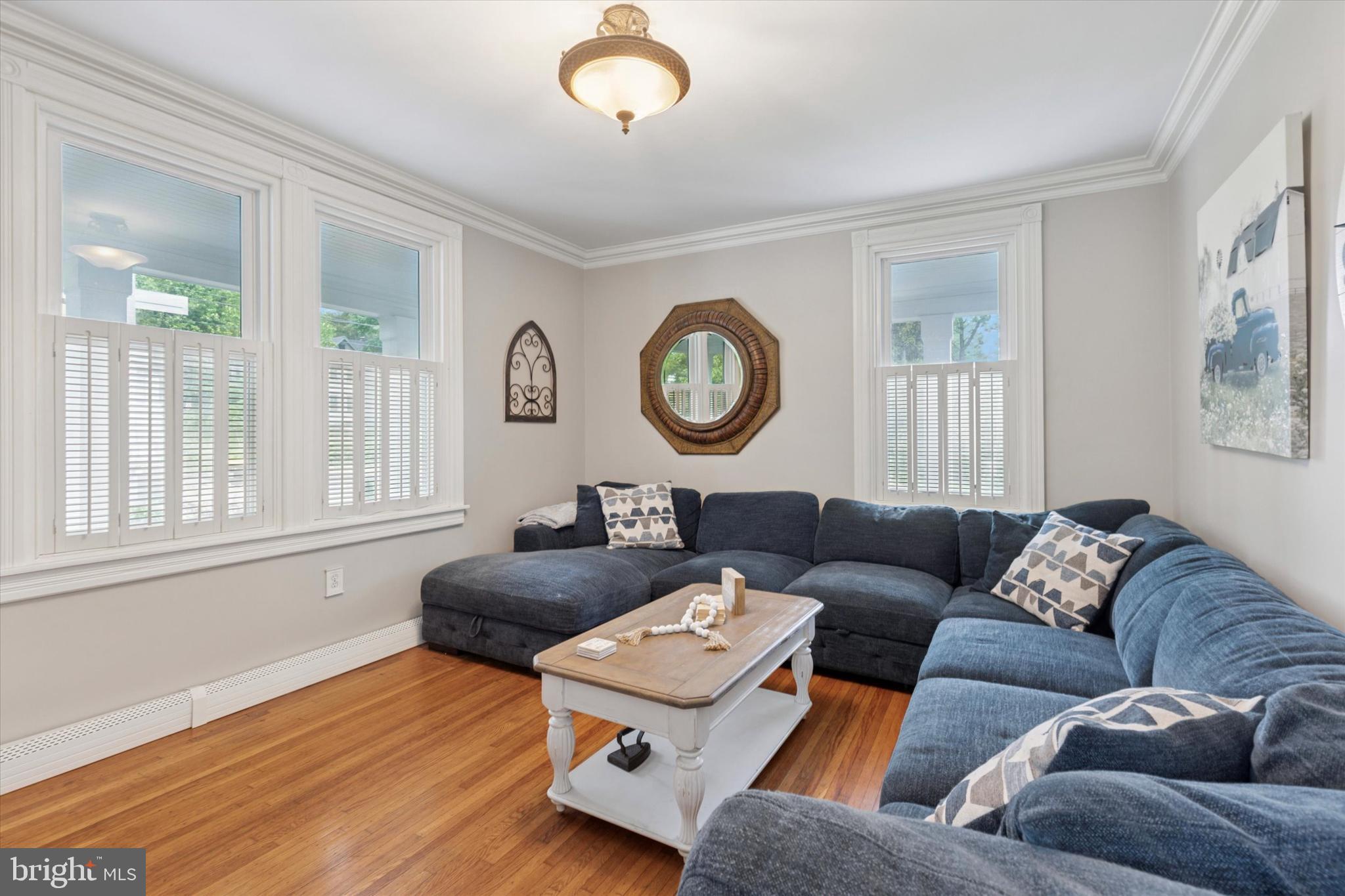 802 Upper Gulph Road Wayne, PA 19087 - Photo 10 of 45 a living room with furniture and a window