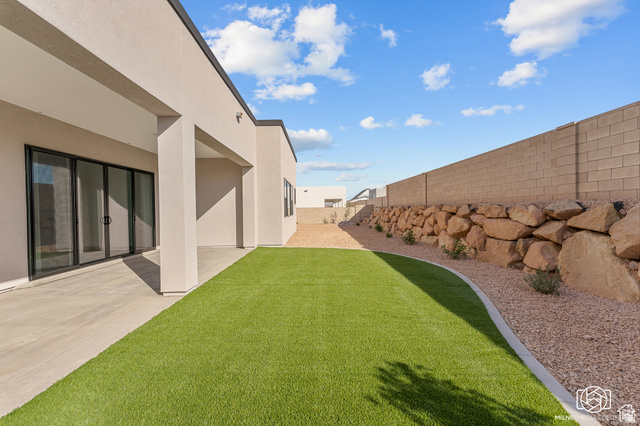 707 Spring Lily Drive St. George, UT 84790 - Photo 39 of 43 Covered patio with concrete flooring