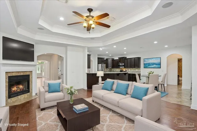 a view of workspace with wooden floor windows