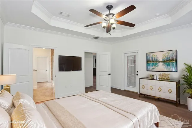 a backyard of a house with lots of green space and fountain