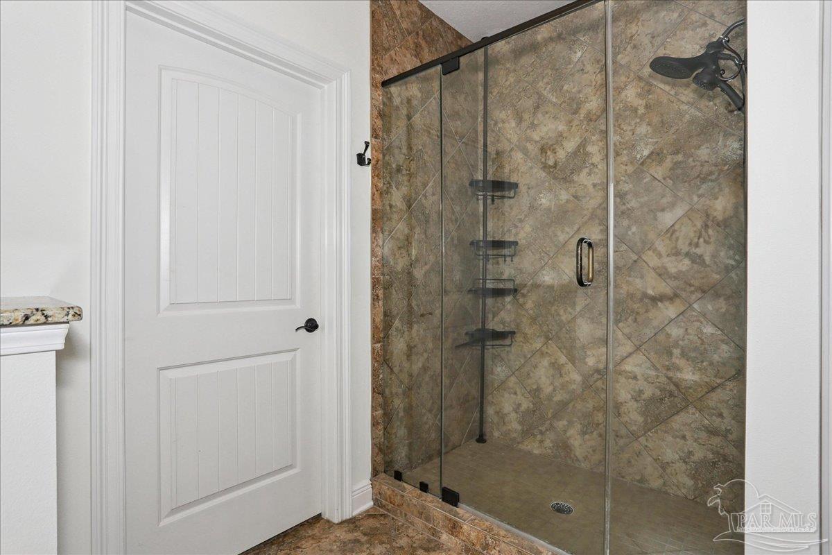 8414 Foxtail Loop Pensacola, FL 32526 - Photo 30 of 61 a bathroom with a shower