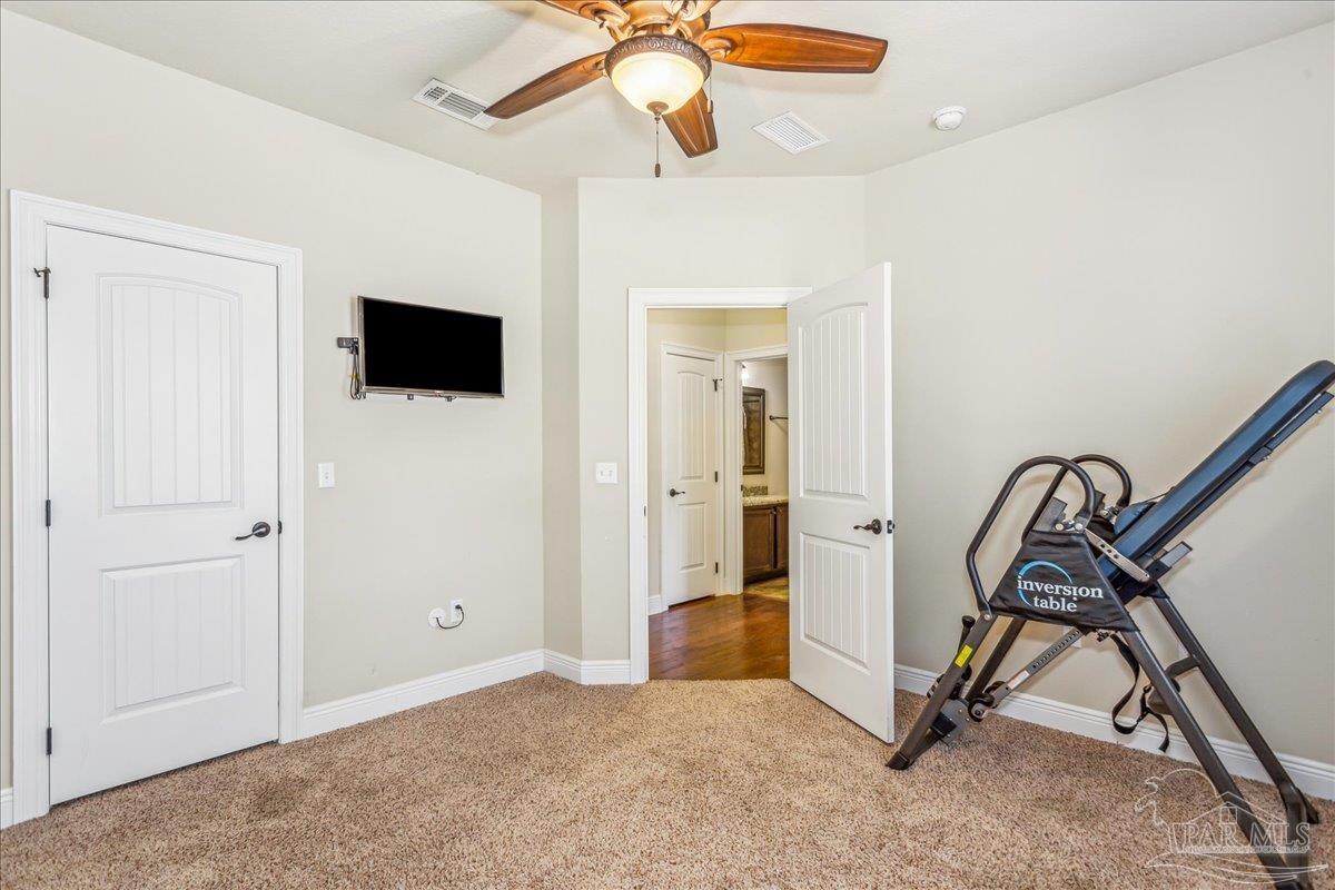 8414 Foxtail Loop Pensacola, FL 32526 - Photo 33 of 61 a view of a livingroom with a workspace