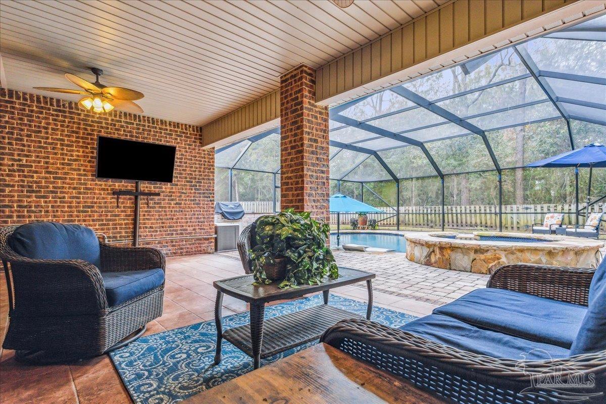 8414 Foxtail Loop Pensacola, FL 32526 - Photo 45 of 61 a building outdoor space with patio furniture