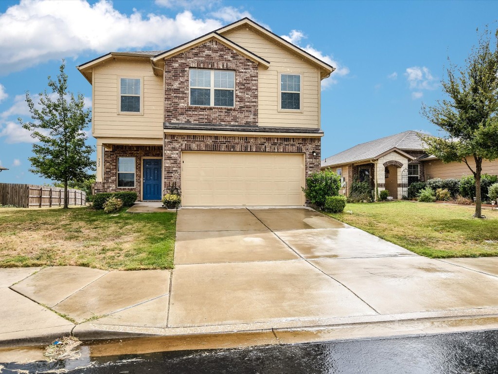 522 Pinnacle Drive Georgetown, TX 78626 - Photo 1 of 1 a front view of a house with garden