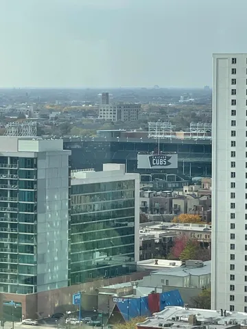 a view of a city with tall buildings