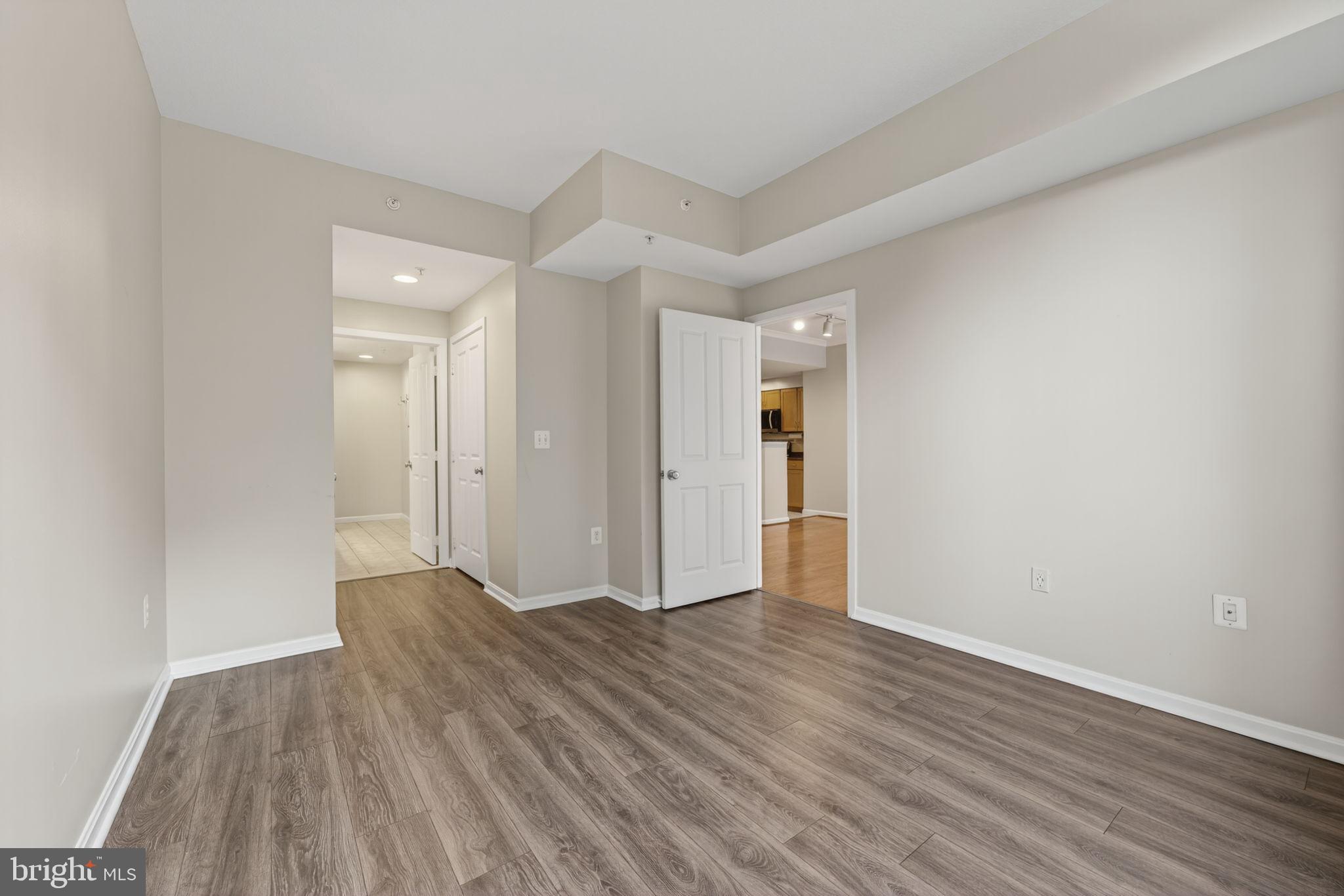 2220 Fairfax Drive, Unit 206 Arlington, VA 22201 - Photo 13 of 25 wooden floor in an empty room