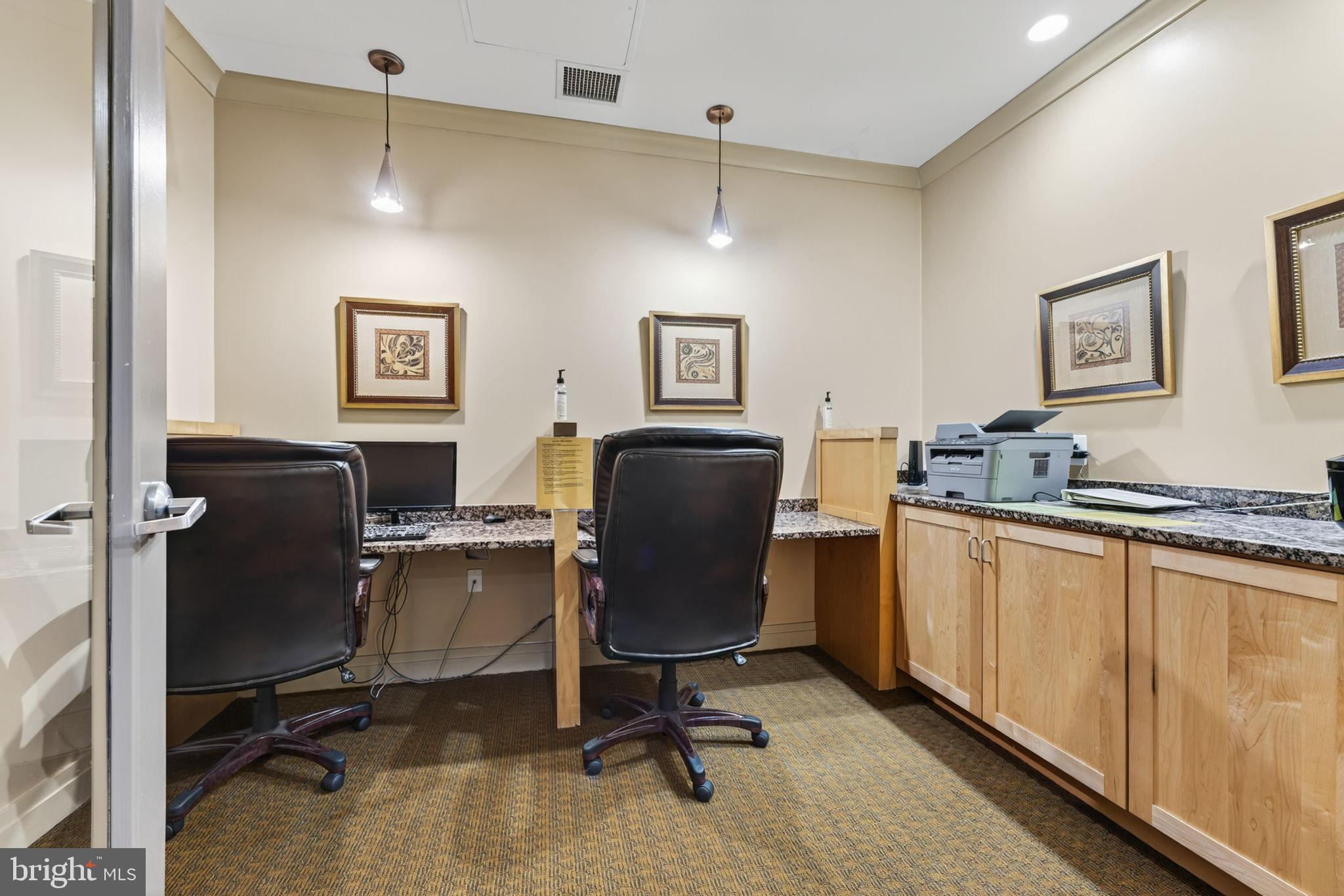 2220 Fairfax Drive, Unit 206 Arlington, VA 22201 - Photo 22 of 25 a view of a workspace with furniture and a window