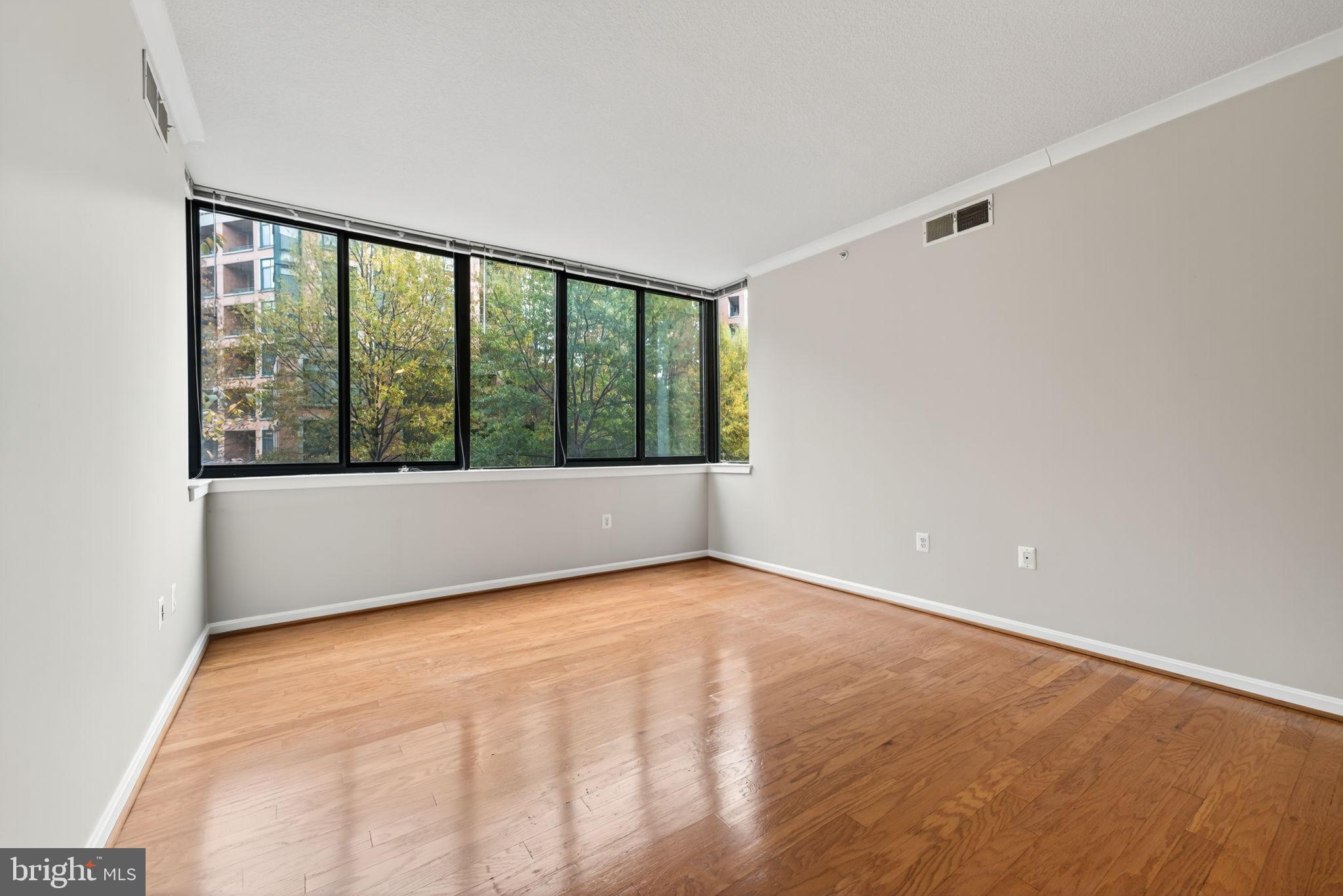 2220 Fairfax Drive, Unit 206 Arlington, VA 22201 - Photo 9 of 25 a view of an empty room with a window