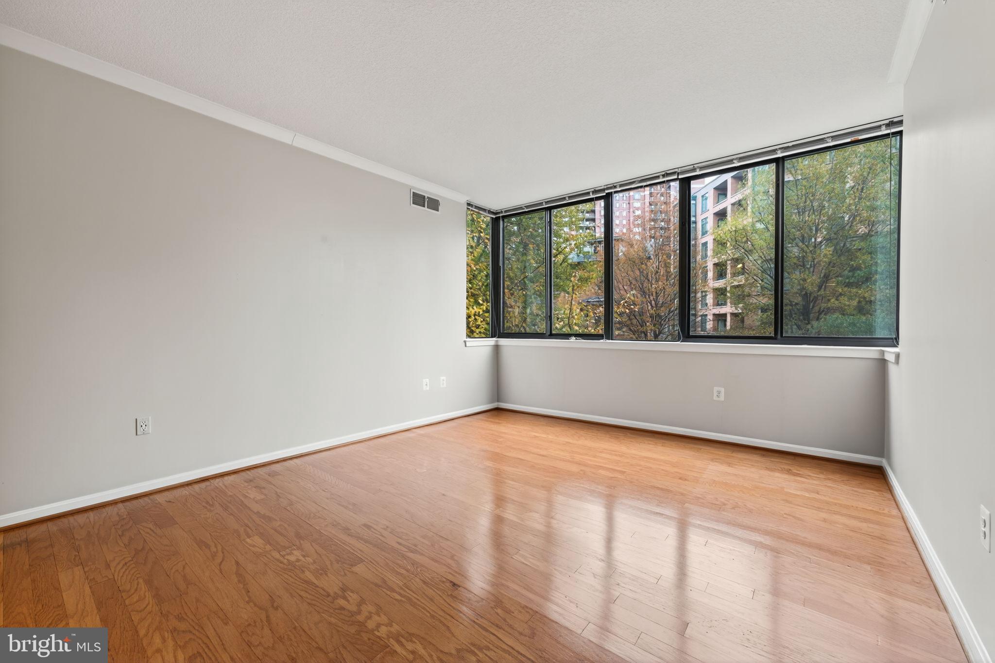 2220 Fairfax Drive, Unit 206 Arlington, VA 22201 - Photo 10 of 25 a view of an empty room with a window