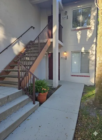 a view of entryway with a front door