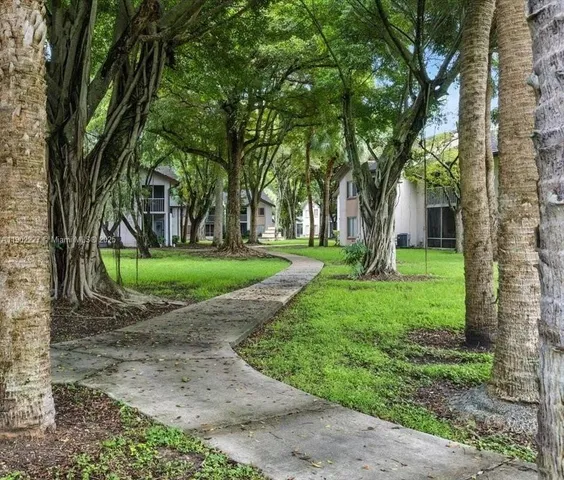 a view of a house with a big yard