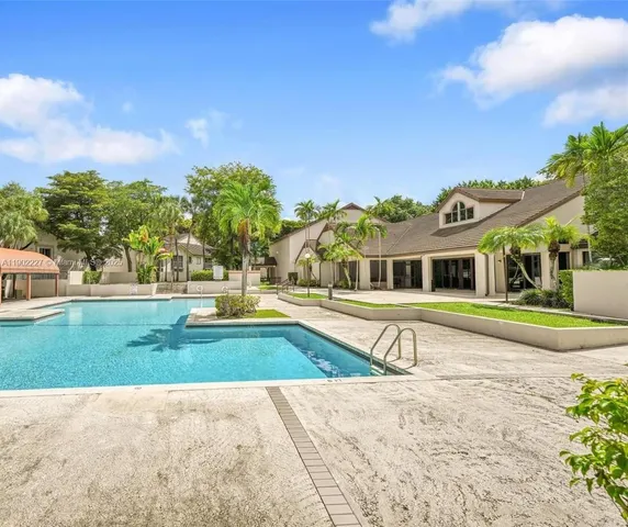 a view of street with palm trees