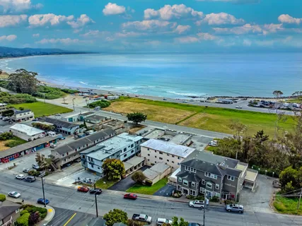 an aerial view of a building with outdoor space
