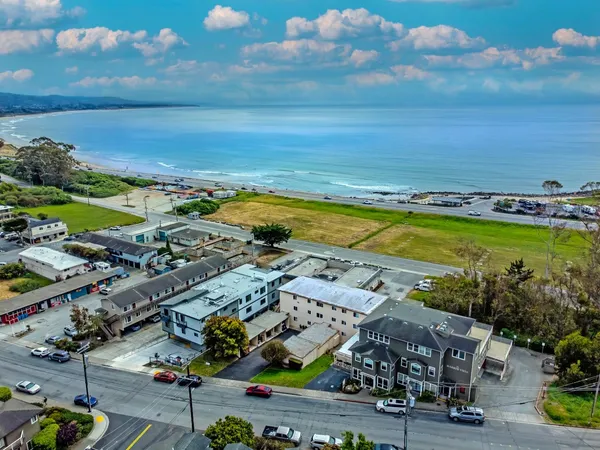 an aerial view of a building with outdoor space