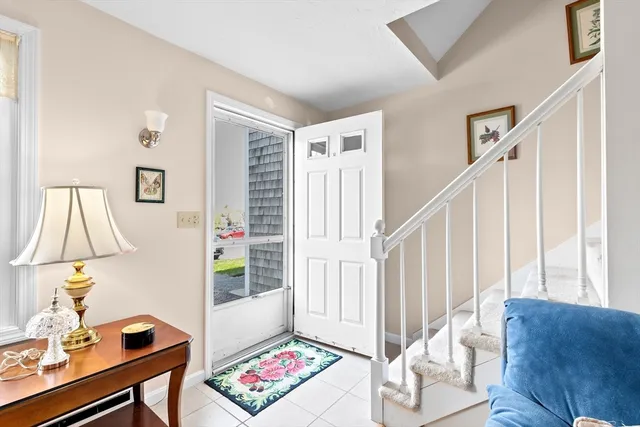 a bedroom with a bed and dresser