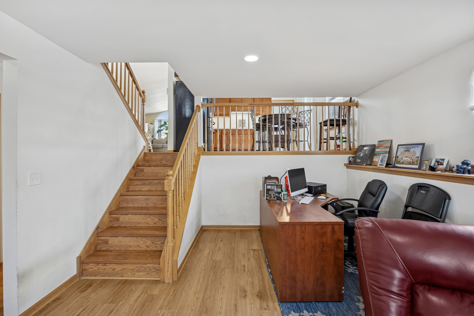 14925 Whipple Street Markham, IL 60428 - Photo 14 of 16 a workspace with wooden floor and windows