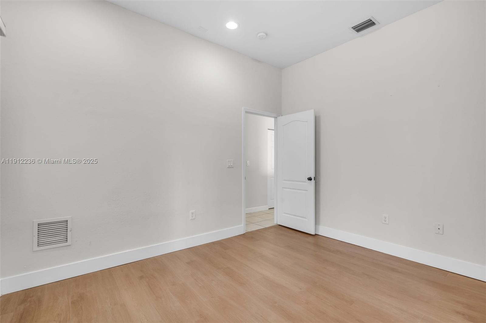 8920 Northwest 180th Terrace Hialeah, FL 33018 - Photo 15 of 44 a view of an empty room