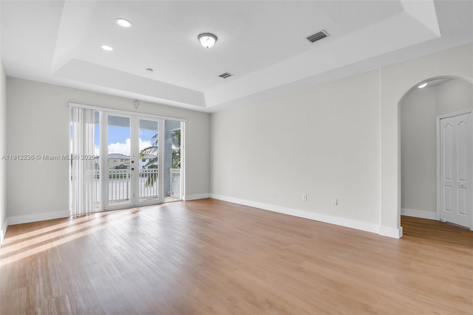 8920 Northwest 180th Terrace Hialeah, FL 33018 - Photo 22 of 44 a view of a livingroom with wooden floor