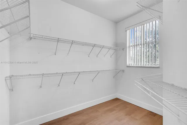 a view of a room with racks on the wall