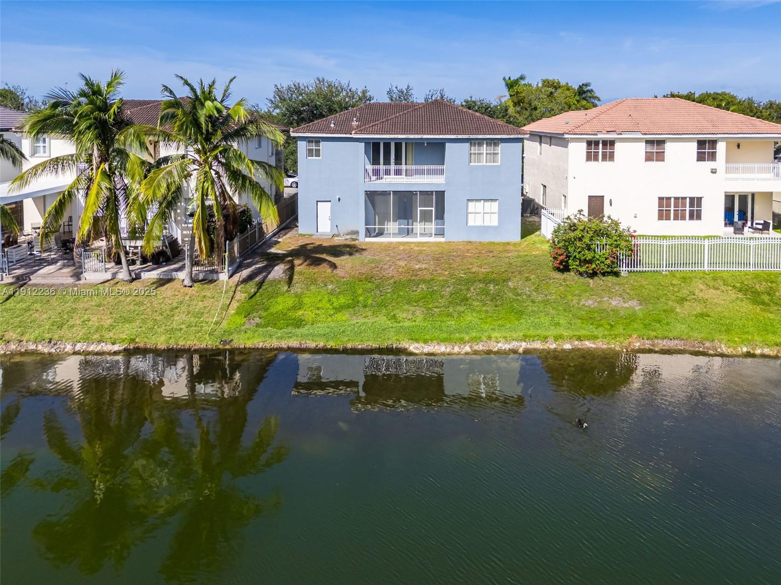 8920 Northwest 180th Terrace Hialeah, FL 33018 - Photo 44 of 44 a view of a house with a yard