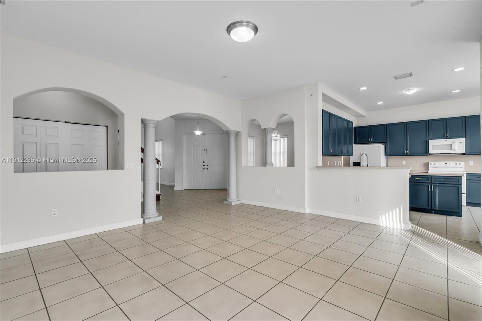 8920 Northwest 180th Terrace Hialeah, FL 33018 - Photo 5 of 44 a view of a electric appliances and cabinets in a room