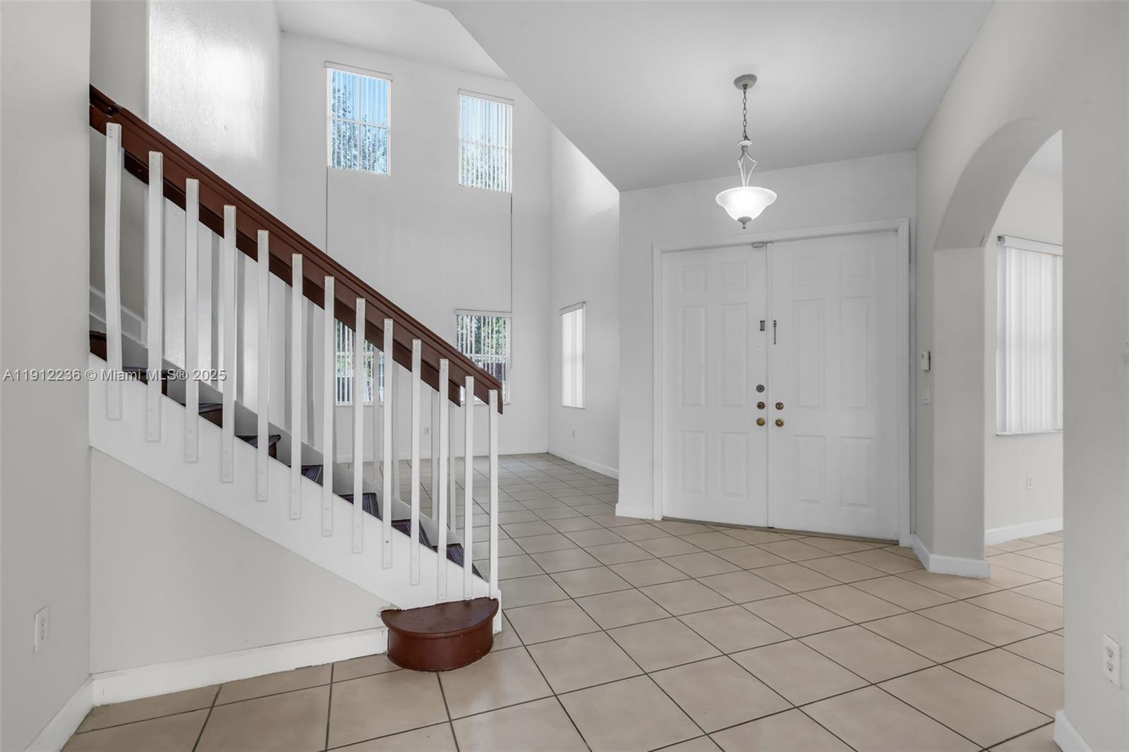 8920 Northwest 180th Terrace Hialeah, FL 33018 - Photo 7 of 44 a view of entryway and hall