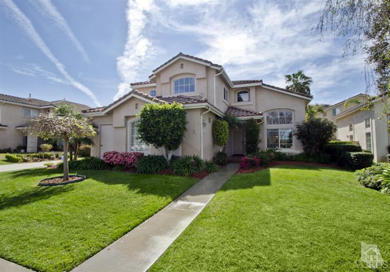 2364 Fitzgerald Road Simi Valley, CA 93065 - Photo 1 of 20 a front view of a house with a yard and garage