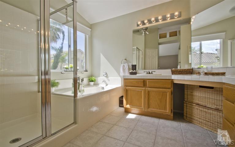 2364 Fitzgerald Road Simi Valley, CA 93065 - Photo 12 of 20 a bathroom with a sink vanity and mirror