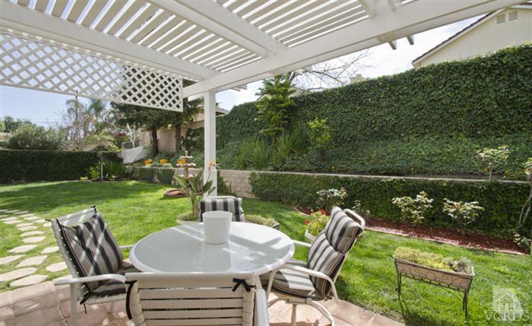 2364 Fitzgerald Road Simi Valley, CA 93065 - Photo 17 of 20 a view of a chairs and table in patio next to a yard