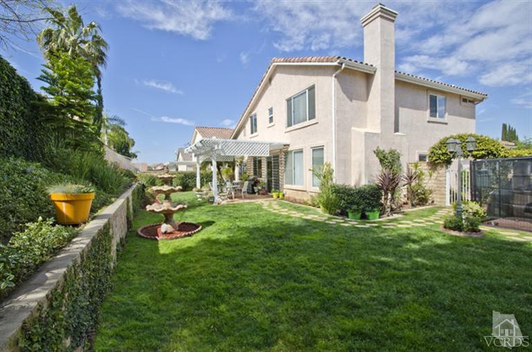 2364 Fitzgerald Road Simi Valley, CA 93065 - Photo 20 of 20 a front view of a house with garden and sitting area