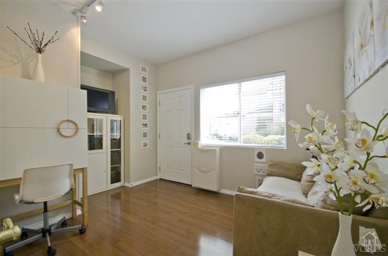 2364 Fitzgerald Road Simi Valley, CA 93065 - Photo 5 of 20 a view of a livingroom with a window and chair