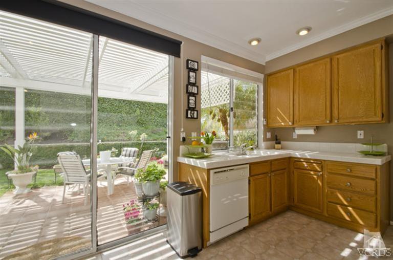 2364 Fitzgerald Road Simi Valley, CA 93065 - Photo 10 of 20 a kitchen with a sink and view of living room