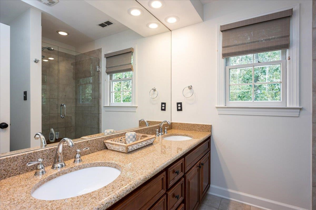 7404 Wilderness Road Raleigh, NC 27613 - Photo 18 of 29 Owner Bathroom