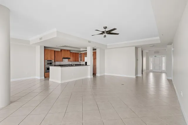 a kitchen with stainless steel appliances granite countertop a stove and a sink