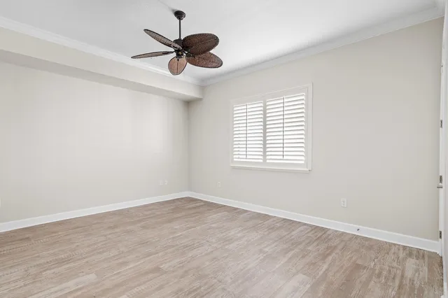 a view of a house with a garden and plants