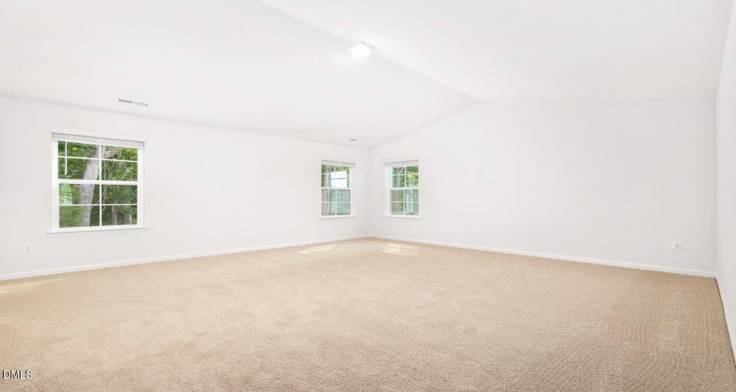 1383 Lansdowne Drive, Unit 401 Mebane, NC 27302 - Photo 22 of 23 an empty room with a window