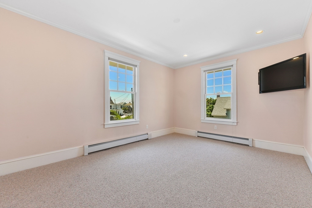 351 Beach Avenue Hull, MA 02045 - Photo 15 of 24 an empty room with windows