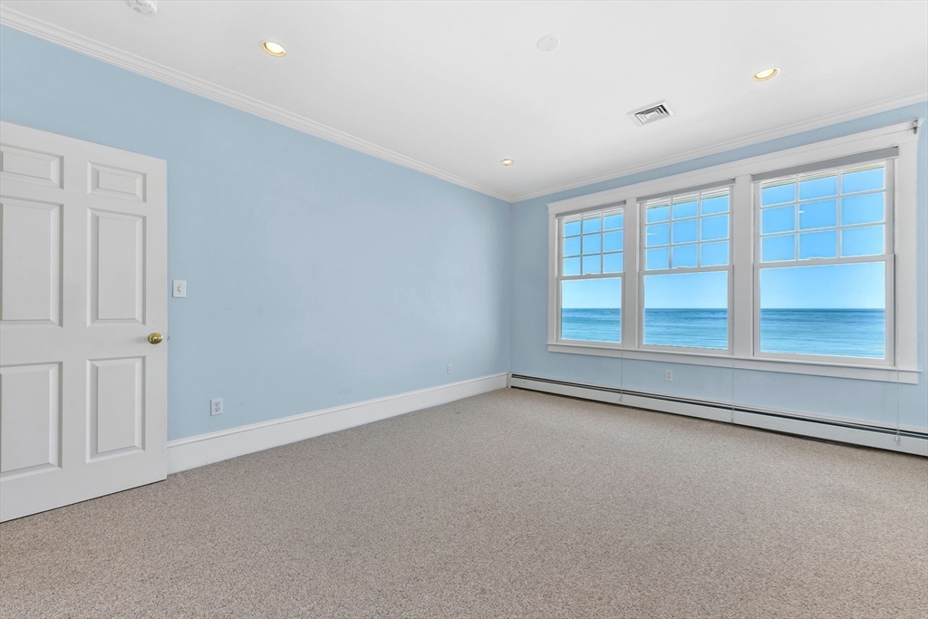 351 Beach Avenue Hull, MA 02045 - Photo 19 of 24 an empty room with windows