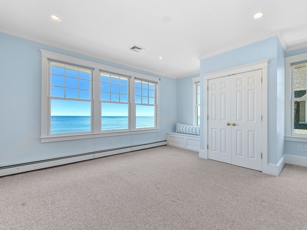 351 Beach Avenue Hull, MA 02045 - Photo 21 of 24 an empty room with windows