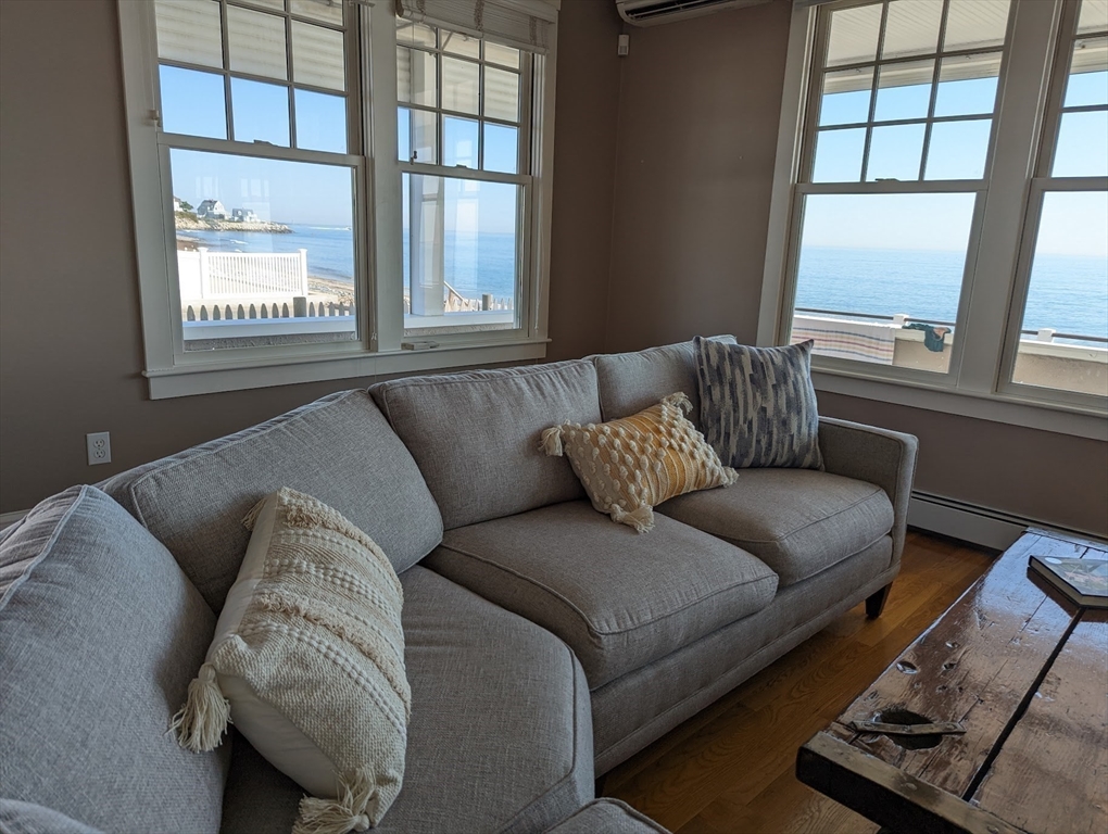 351 Beach Avenue Hull, MA 02045 - Photo 8 of 24 a living room with furniture and a window