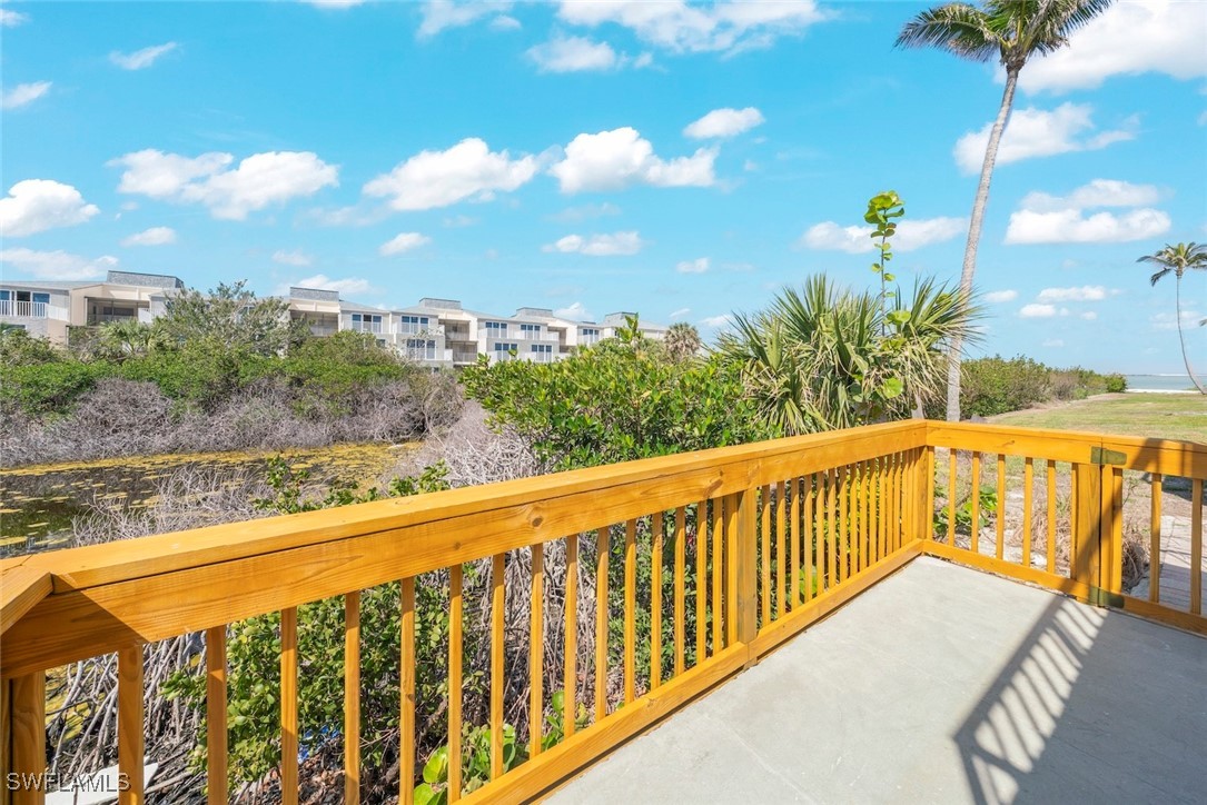 200 Periwinkle Way, Unit 132 Sanibel, FL 33957 - Photo 32 of 44 a view of a balcony with lake view