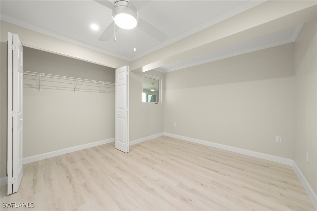 200 Periwinkle Way, Unit 132 Sanibel, FL 33957 - Photo 36 of 44 wooden floor in an empty room