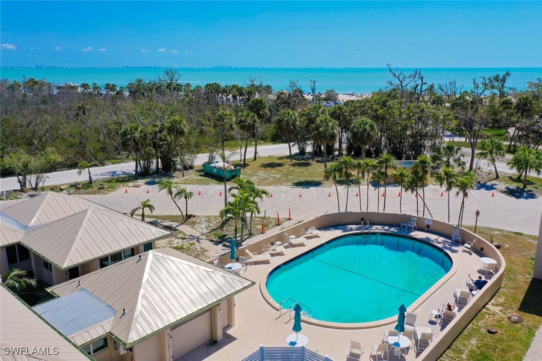 200 Periwinkle Way, Unit 132 Sanibel, FL 33957 - Photo 5 of 44 an aerial view of a house with swimming pool patio and outdoor seating