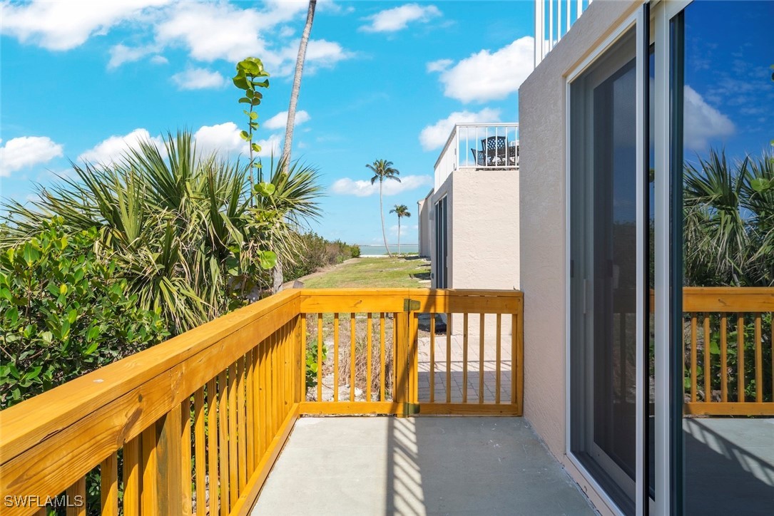 200 Periwinkle Way, Unit 132 Sanibel, FL 33957 - Photo 6 of 44 a view of balcony with furniture