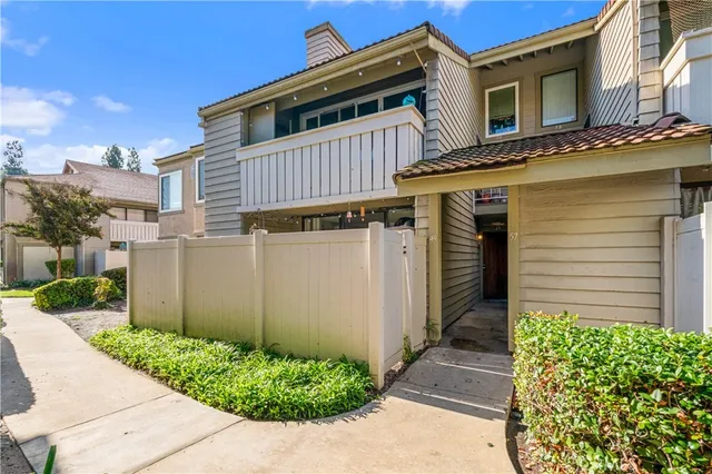 a view of a house with a small garden