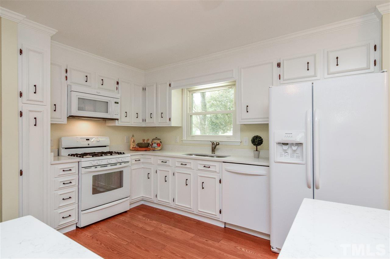 5612 Laniel Court Raleigh, NC 27612 - Photo 13 of 25 Gas range, new microwave and brand new refrigerator