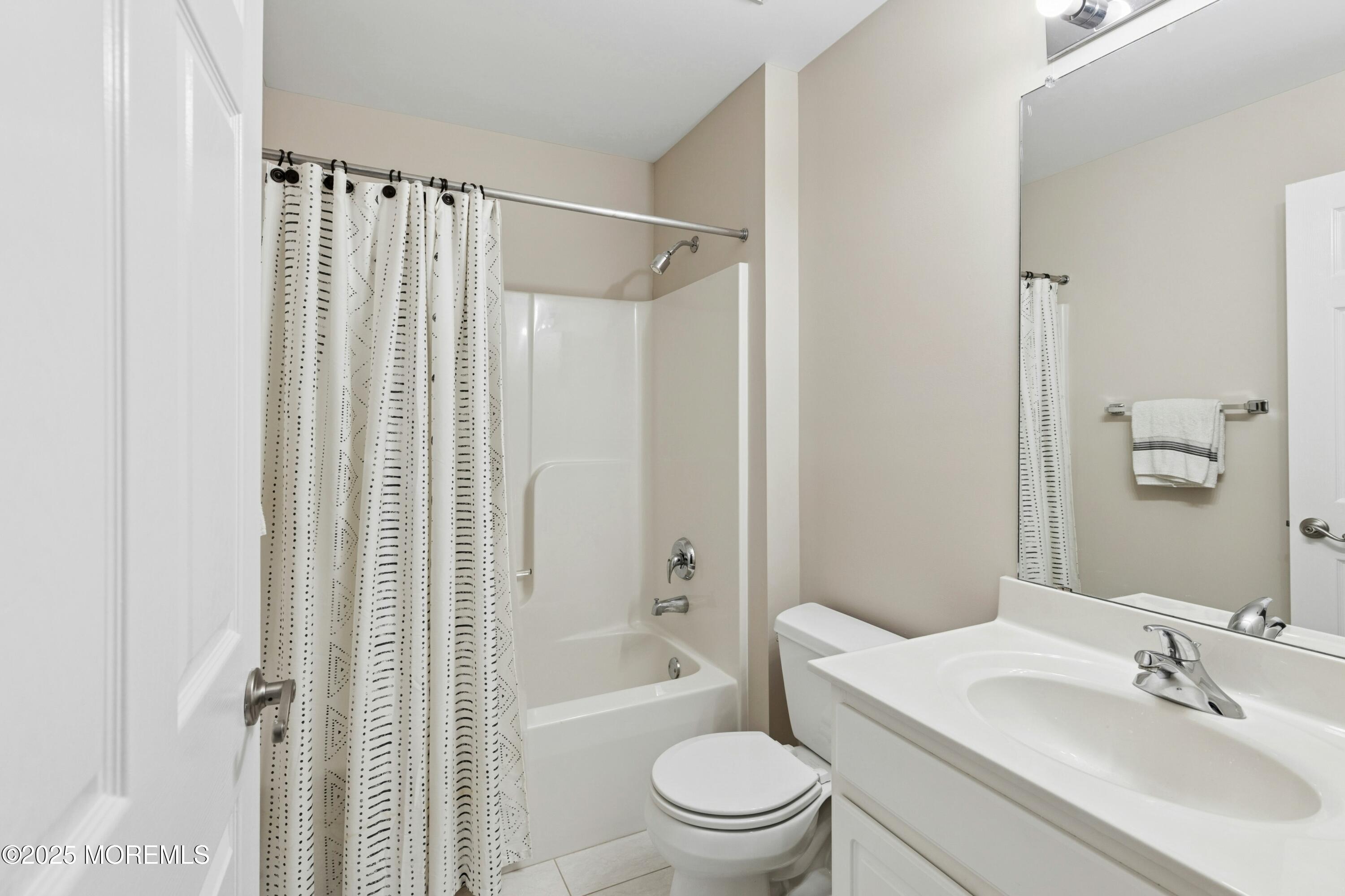 7 Topaz Drive Jackson, NJ 08527 - Photo 25 of 51 a bathroom with a sink toilet and shower